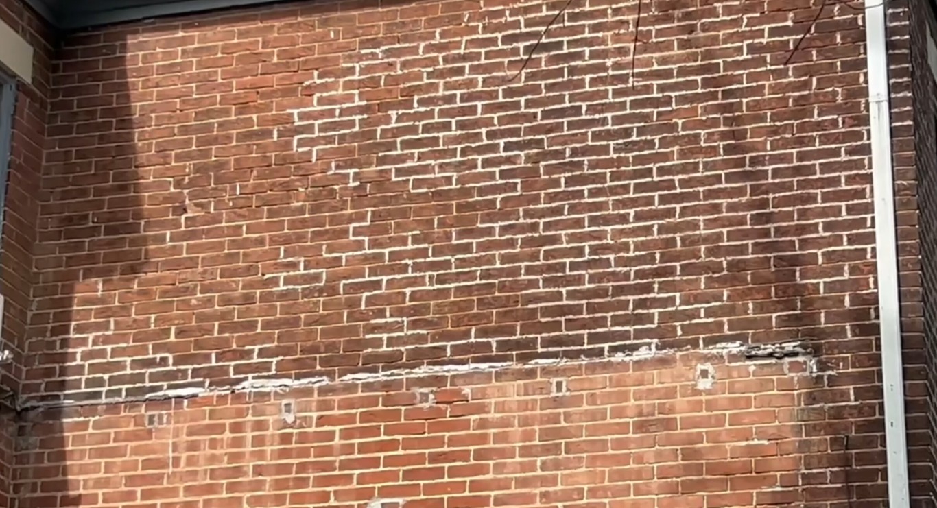 Professional masonry contractors working on brick repair in Fremont, CA